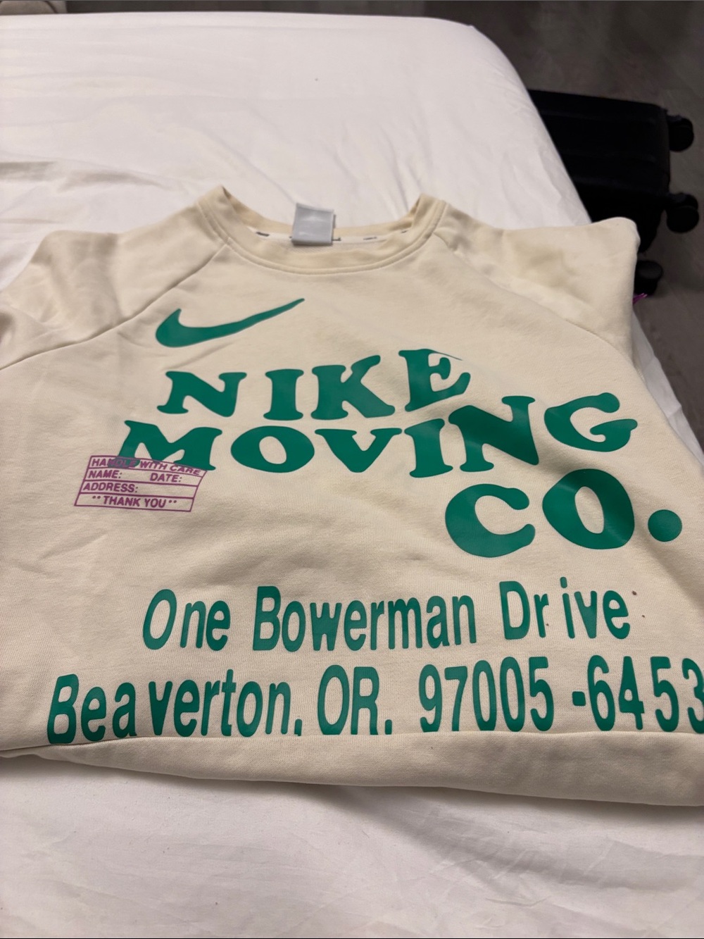 Nike Kids Cream Sweatshirt with Teal Graphic